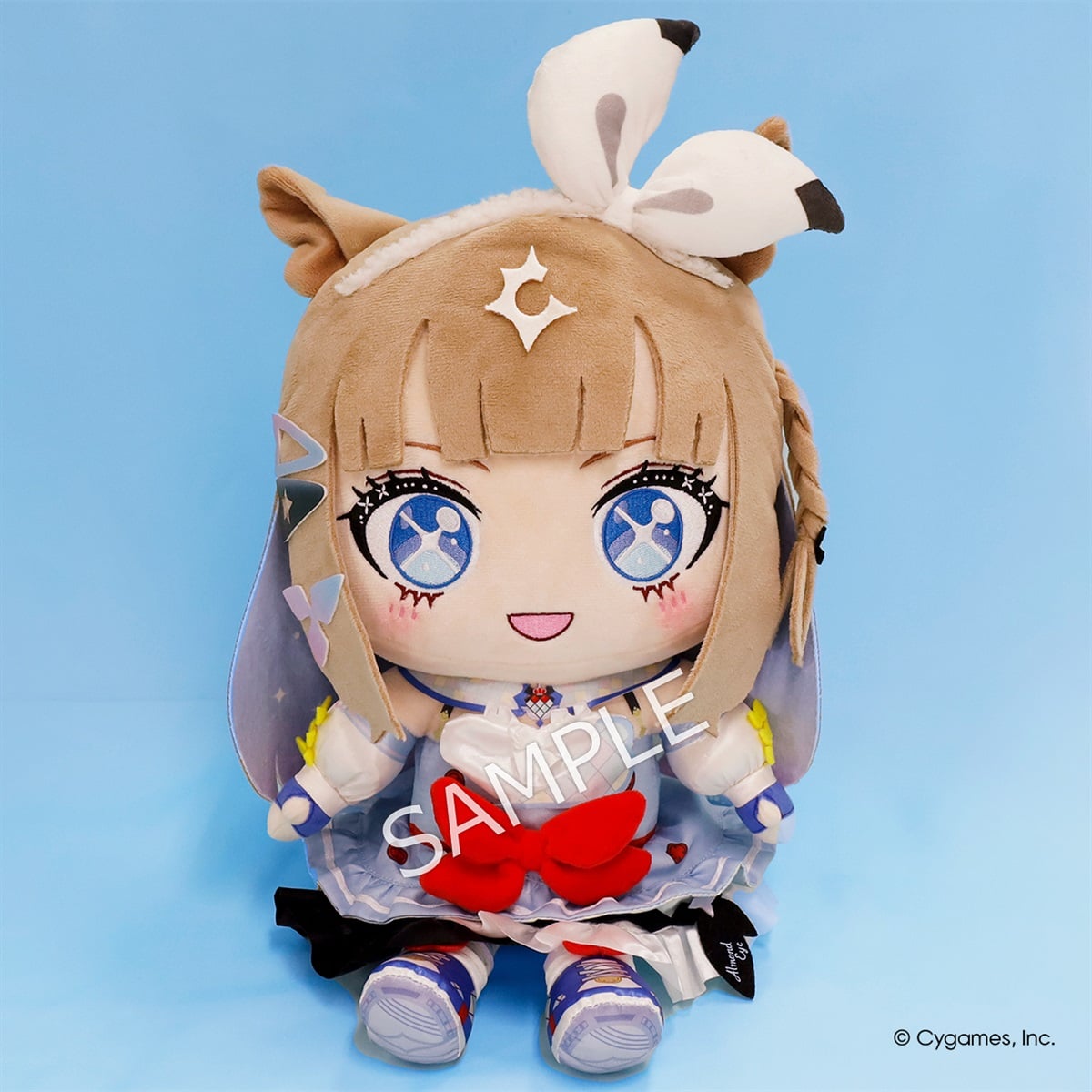 Front view of the Almond Eye big mascot plush showing its face, outfit, and seated pose on a light blue background.