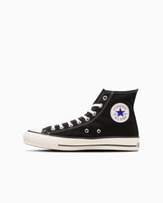 Black canvas high-top sneaker shown in side profile against a white background.
