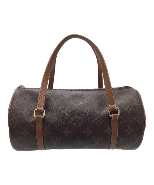 Cylindrical brown cow leather bag with a monogram pattern and two top handles.