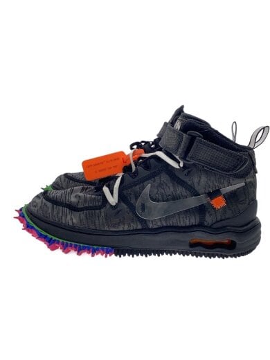 Side view of a black AIR FORCE 1 MID SP sneaker with a multicolored spiked sole and an orange tag.