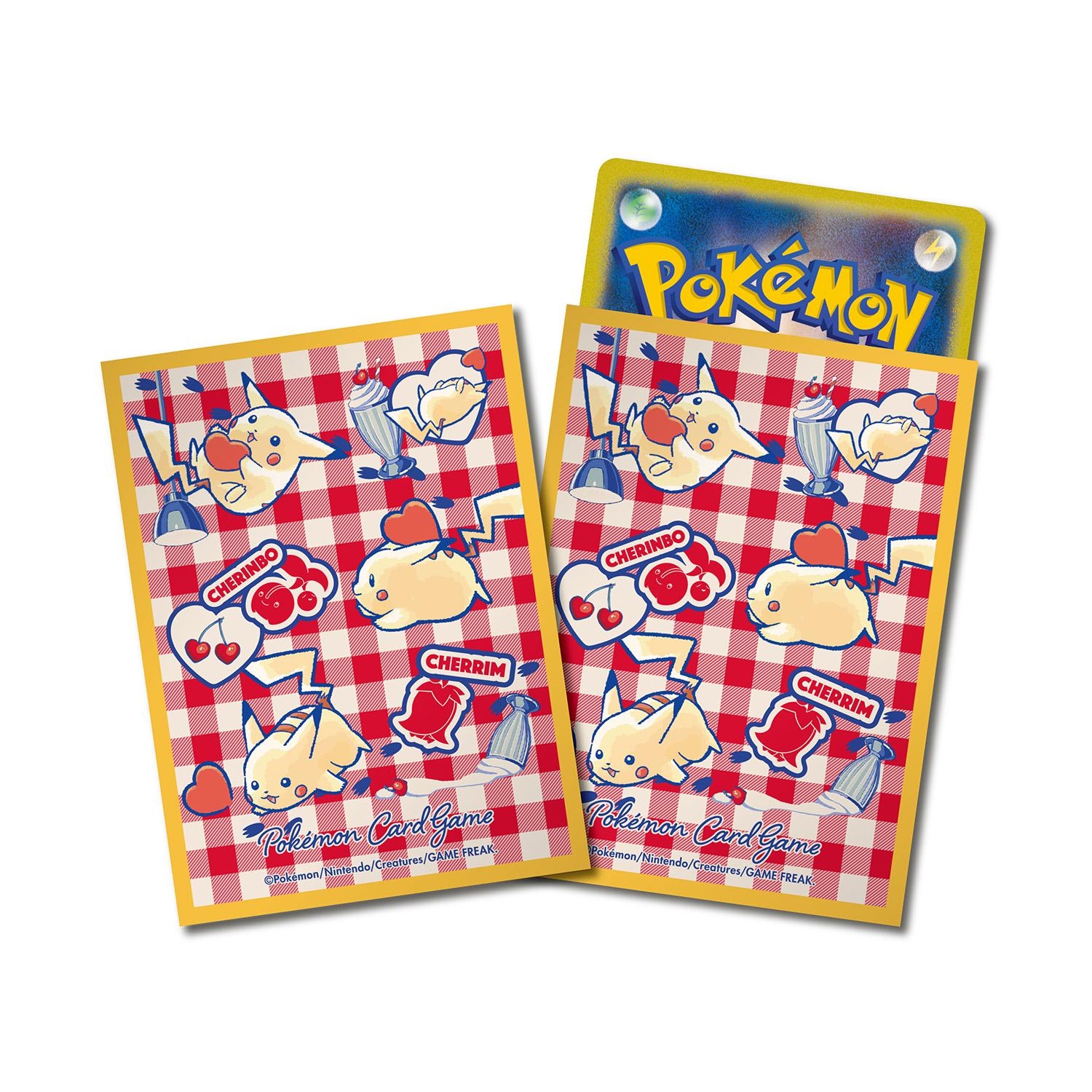 Two orange-bordered Pokémon card sleeves with a Pikachu and heart pattern, one containing a Pokémon card.