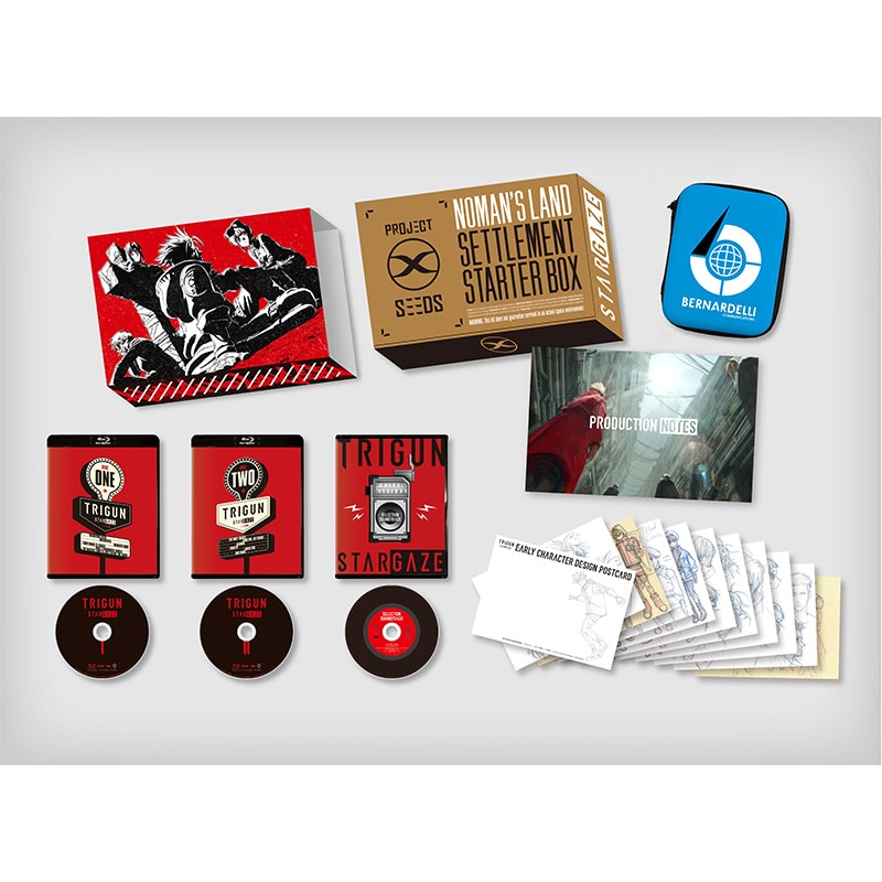 Layout photo of the TRIGUN STARGAZE Blu-ray BOX limited edition showing the outer box, discs, sleeves, booklet, postcards, and accessories.