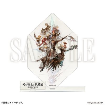 Acrylic display stand featuring the Warrior of Light illustration mounted on a shaped panel with a rectangular base.